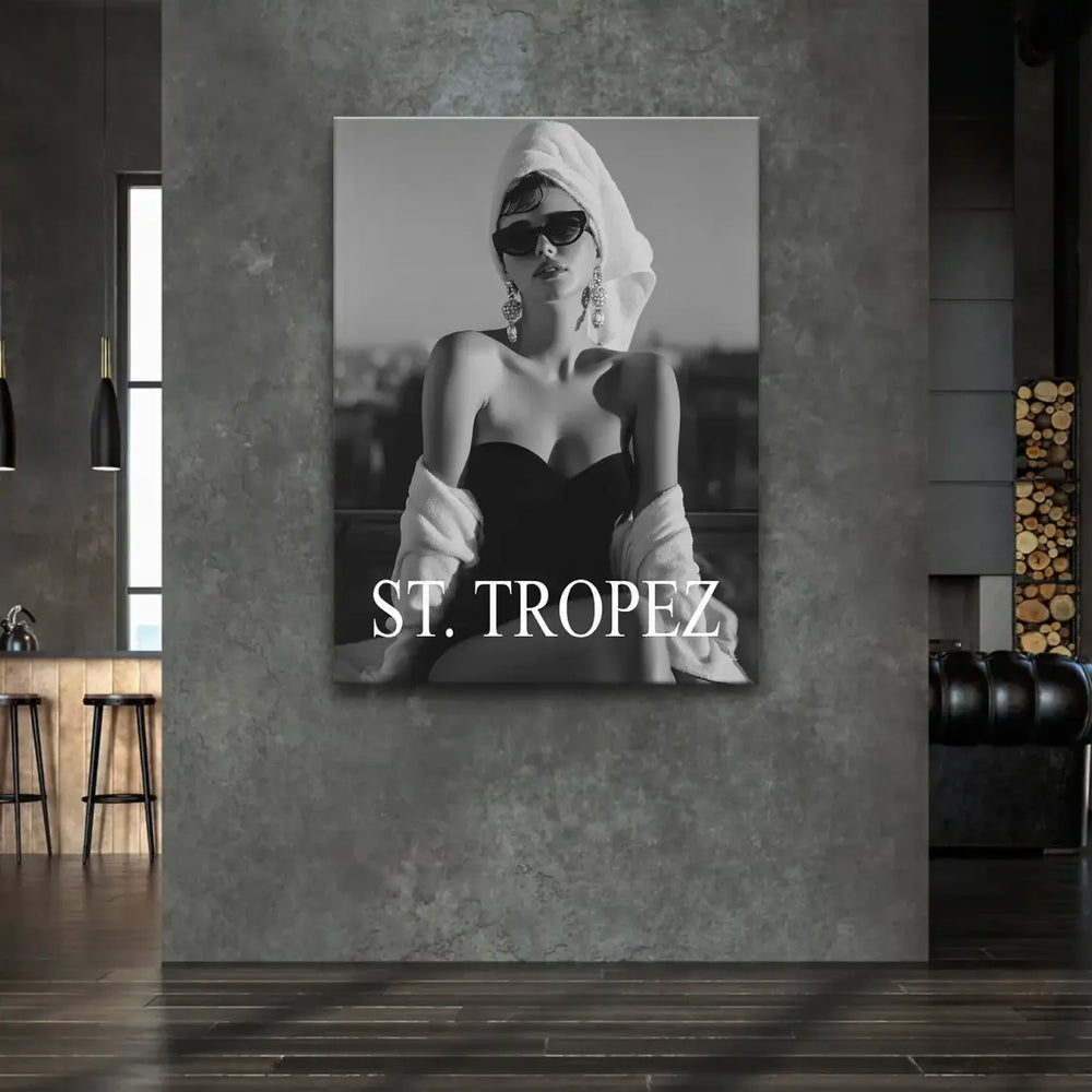 Monochrome fashion wall art with a poised woman against a bright background