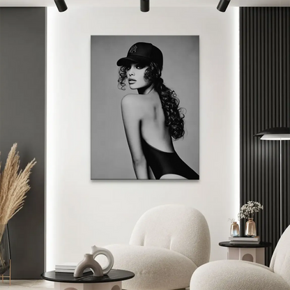 Close-up of long curly hair and strong monochrome contrast in a fashion portrait