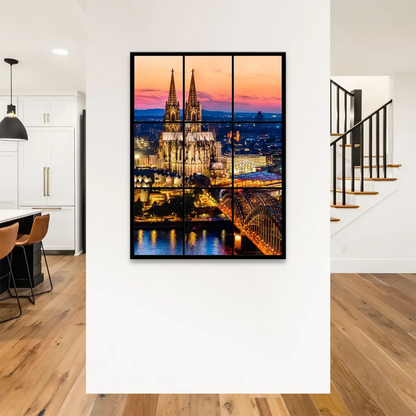 Warm city lights glow in Cologne skyline at twilight