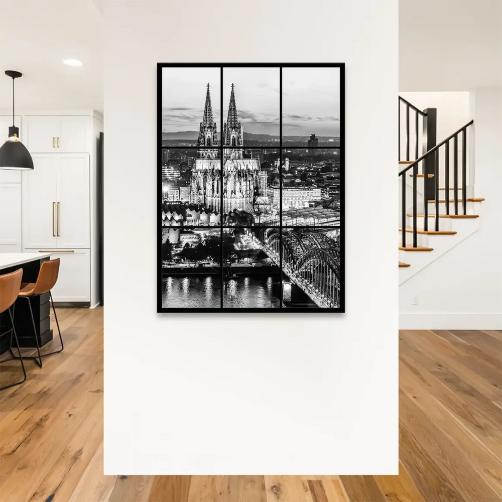 Twinkling city lights along the Rhine River shimmer beneath the skyline.
