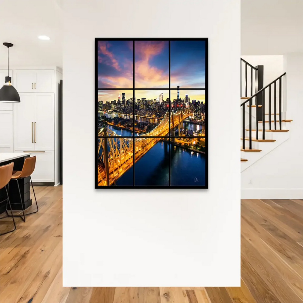 Illuminated New York City skyline at dusk with golden lights and purple-blue sky