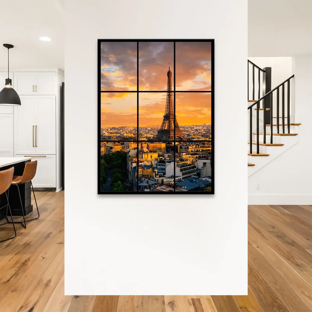 Paris skyline bathed in warm orange and yellow sunset hues.