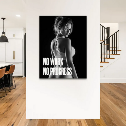 Motivational wall art featuring bold typography and a sculpted athletic figure