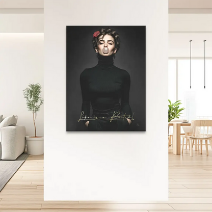 Monochrome backdrop highlighting the bold gold script Life is a Bitch on canvas art