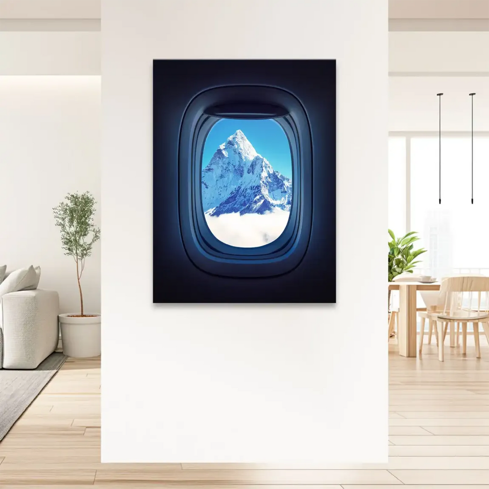 Blue interior tones with icy mountain in a framed window scene