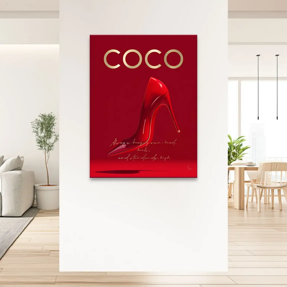 Close-up of a shiny red stiletto against a matching crimson backdrop