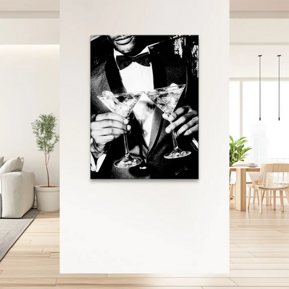 Formally dressed man, hands forming a V shape with glasses, sophisticated celebration