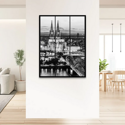 Hohenzollern Bridge arches gracefully over the reflective river.