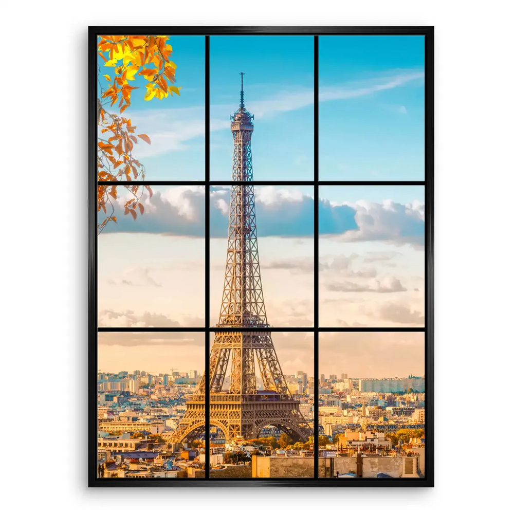 Cityscape of Paris in golden hour light with a blue sky and subtle clouds.