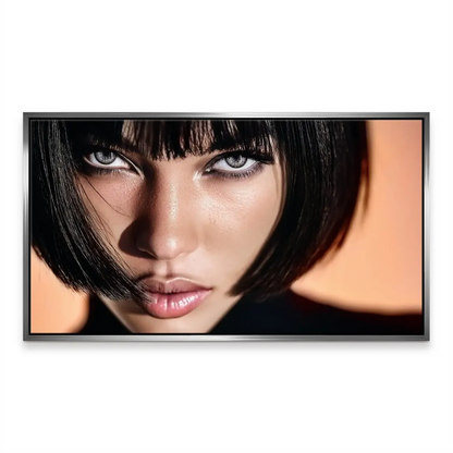 Warm skin tones contrast with deep black hair