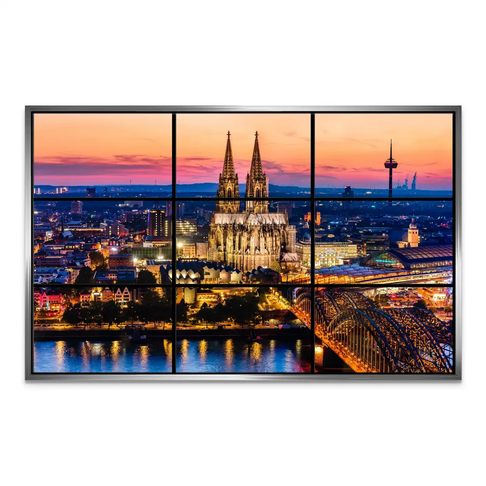 Hohenzollern Bridge illuminated along the Rhine at night