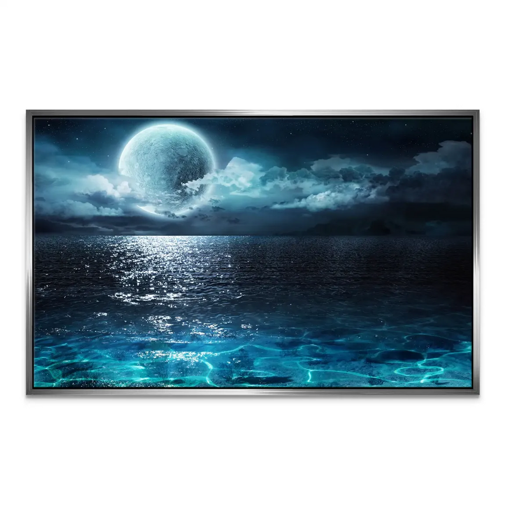 Moonlight reflecting on the sea beneath a starry night sky