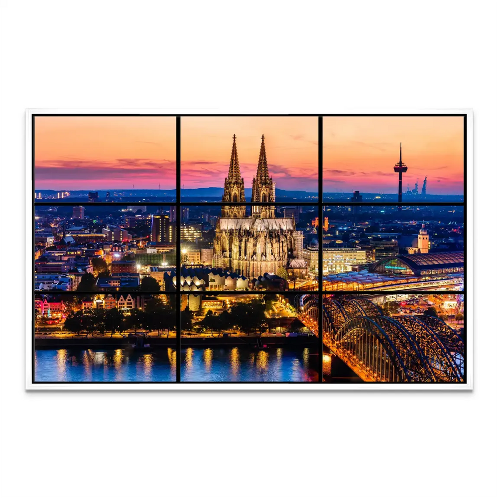 Orange, pink, and purple sunset over Cologne urban riverfront